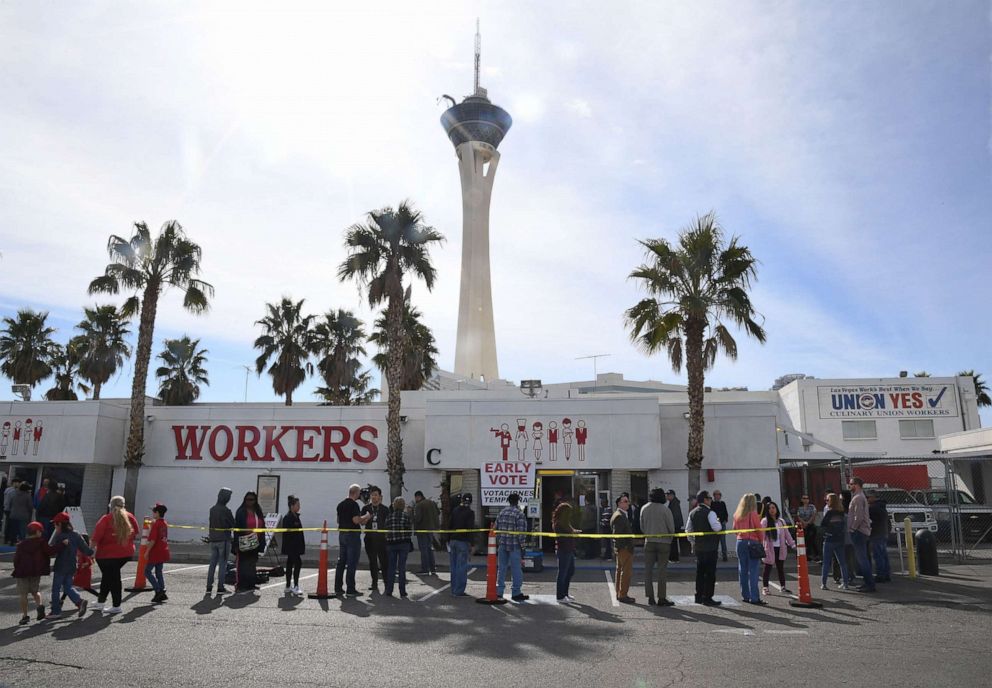 PHOTO: Voters line up outside the Culinary Workers Union Hall Local 226 on the first day of early voting for the upcoming Nevada Democratic presidential caucus, Feb. 15, 2020, in Las Vegas.