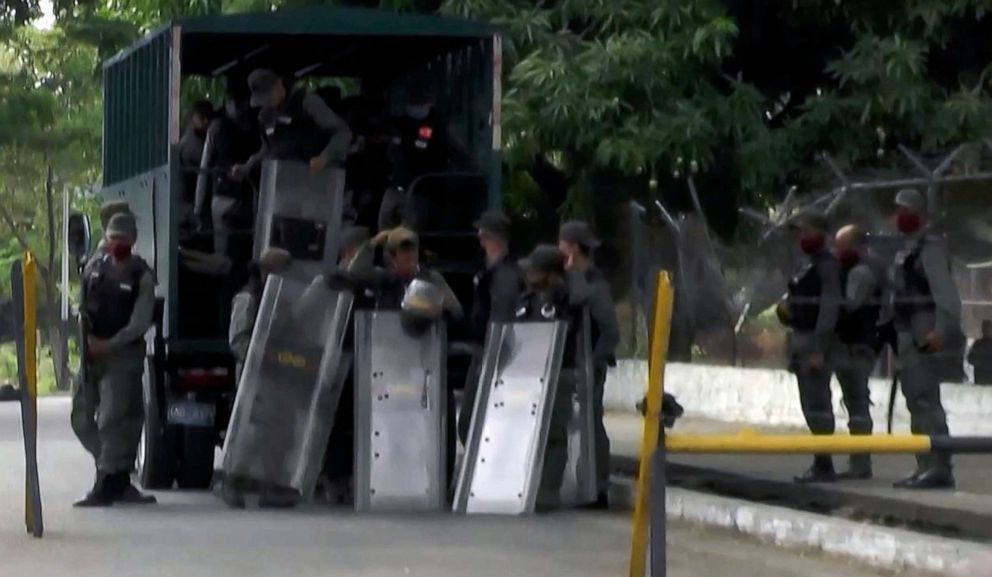 PHOTO:A video grab of members of Bolivarian National Guard as they are deployed outside Los Llanos prison, in Guanare, Venezuela on May 2, 2020, after a riot occurred.
