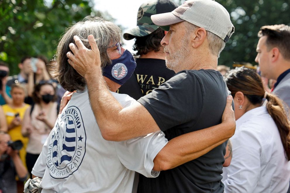 PHOTO: Jon Stewart embraces a fellow activist at the US Capitol in Washington, July 28, 2022. 