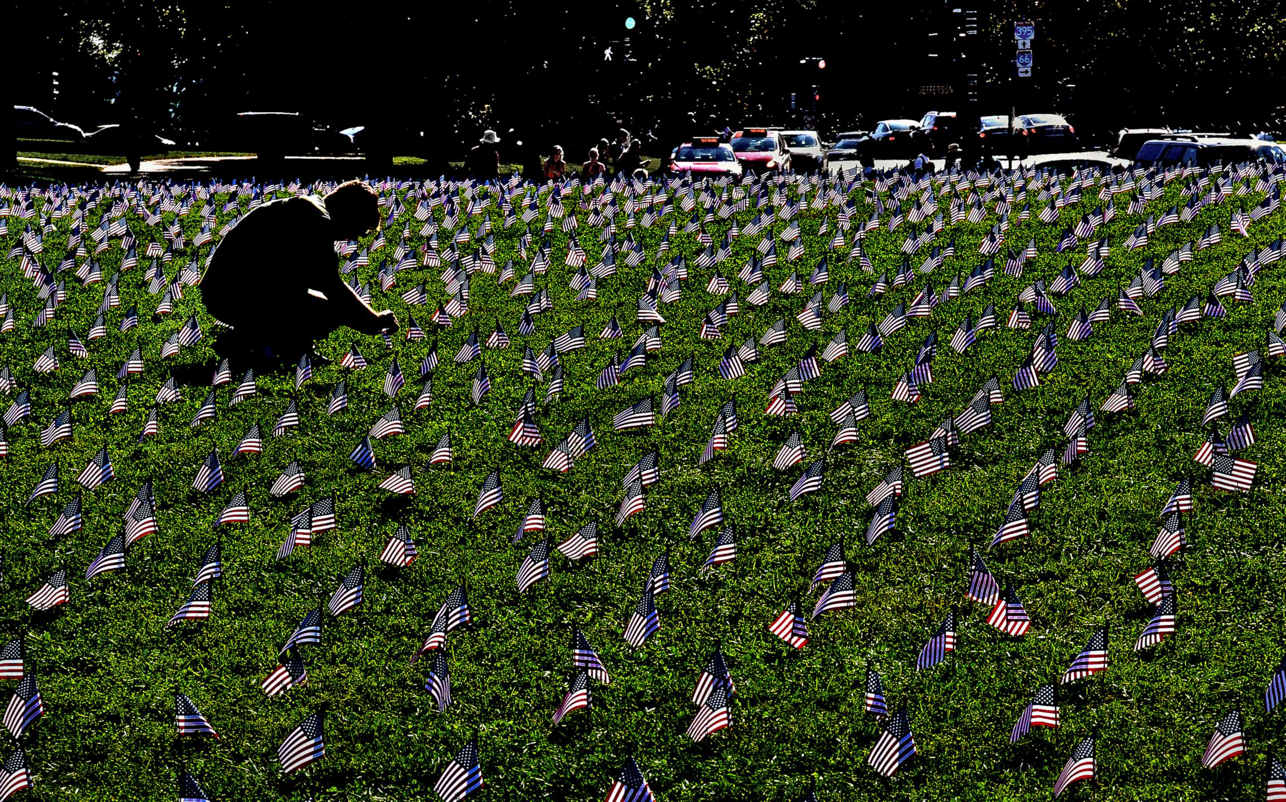 PHOTO: American flags are planted on a grassy area of the National Mall in Washington to represent veterans or service members who died by suicide in 2018, Oct. 4, 2018.