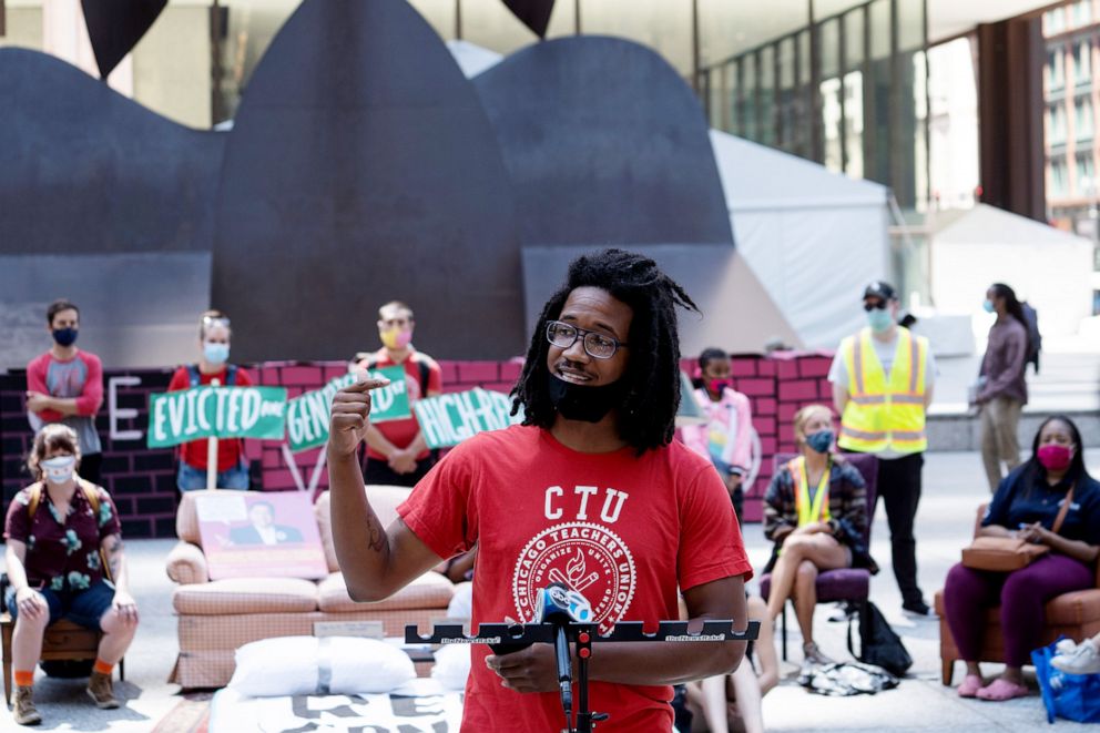 PHOTO: Public Schools teacher Jonathan Wilson speaks during a press conference on the fourth day of an occupation of Daley Plaza outside eviction court in Chicago, Aug. 20, 2020.