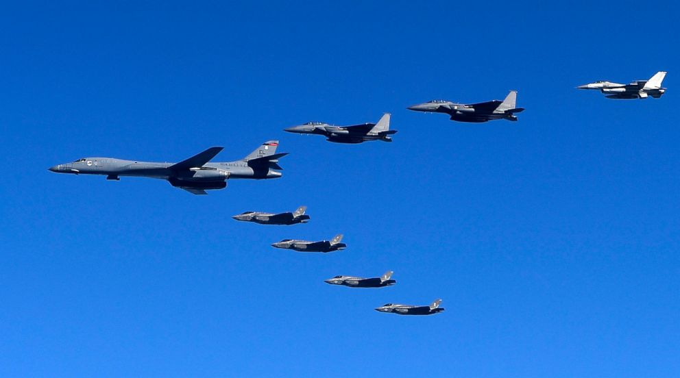 PHOTO: In this handout image provided by South Korean Defense Ministry, U.S. Air Force B-1B bomber, South Korea and U.S. fighter jets fly over the Korean Peninsula during the Vigilant air combat exercise (ACE) on Dec. 6, 2017.