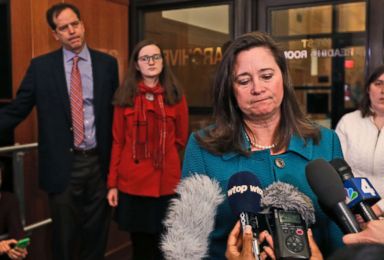 PHOTO: Democratic candidate Shelly Simonds, speaks to the press as her husband, Paul Danehy, left, and daughter, Georgia Danehy, listen after a drawing to determine the winner of a tied election at the Capitol in Richmond, Va., Jan. 4, 2018.