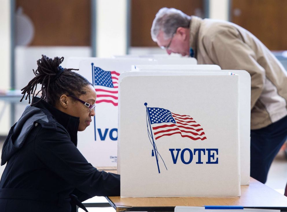 PHOTO: People vote in the Super Tuesday primary at Centreville High School March 1, 2016, in Centreville, Va.