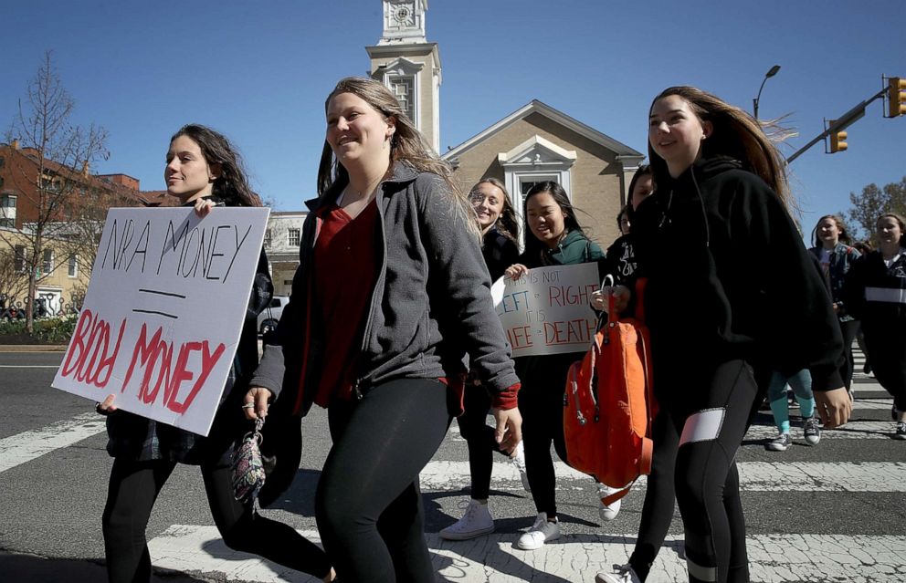 PHOTO: Students from Washington-Lee High School join the National School Walkout while making their way to the U.S. Capitol, April 20, 2018, in Arlington, Virginia.