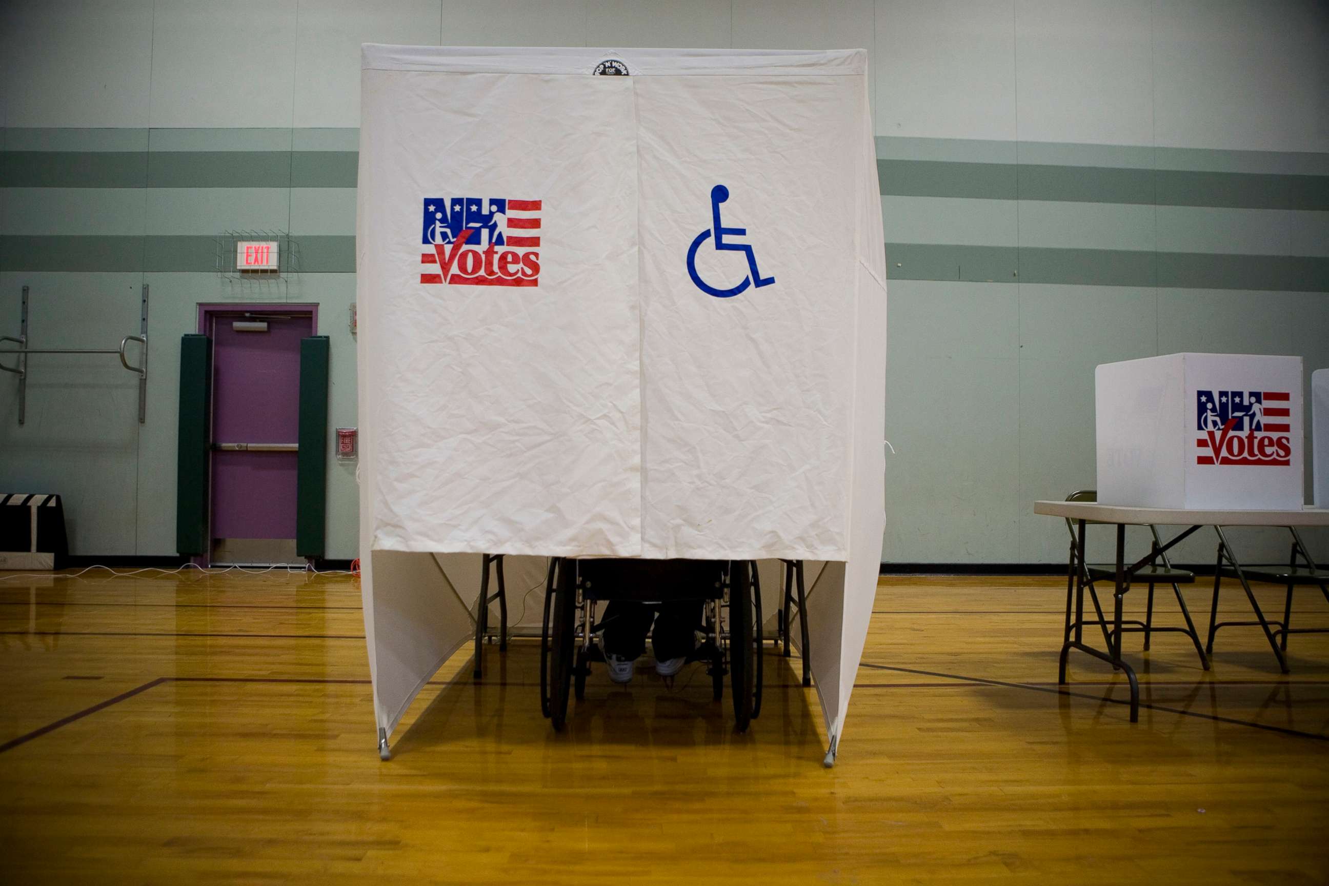 PHOTO: A disabled person uses a specially designed booth for voting during the New Hampshire primary at a high school in Nashua, N.H., Jan. 8, 2008.