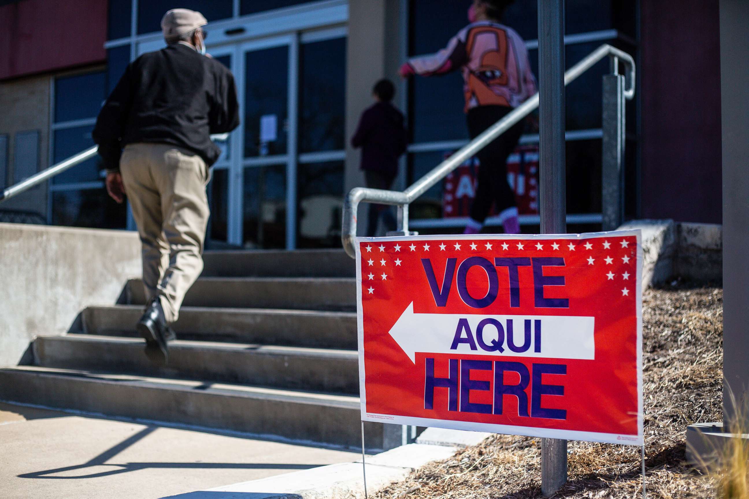 PHOTO: In this March 1, 2022, file photo, people vote at the Carver Branch Library in Austin, Texas.