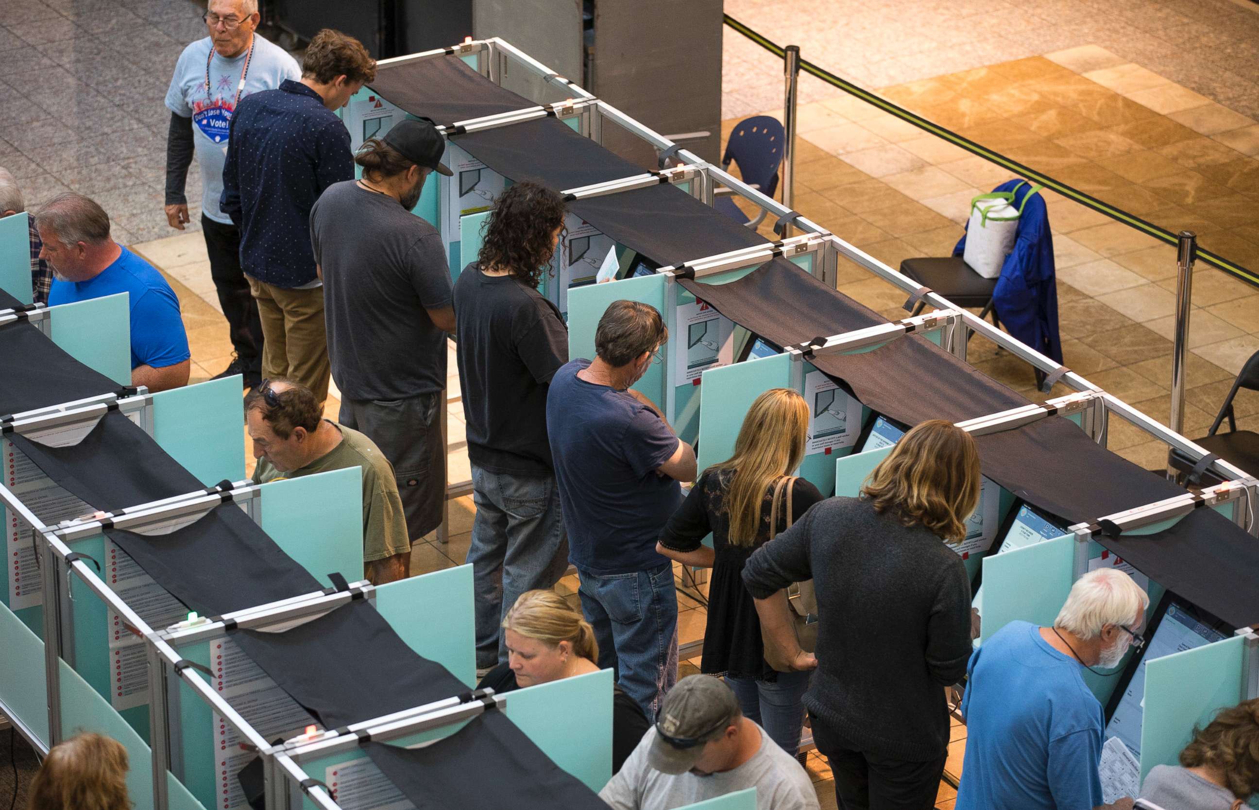 PHOTO: People cast their votes on the third day of early voting at the Galleria at Sunset in Henderson, Nev., Oct. 22, 2018.