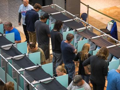 PHOTO: People cast their votes on the third day of early voting at the Galleria at Sunset in Henderson, Nev., Oct. 22, 2018.