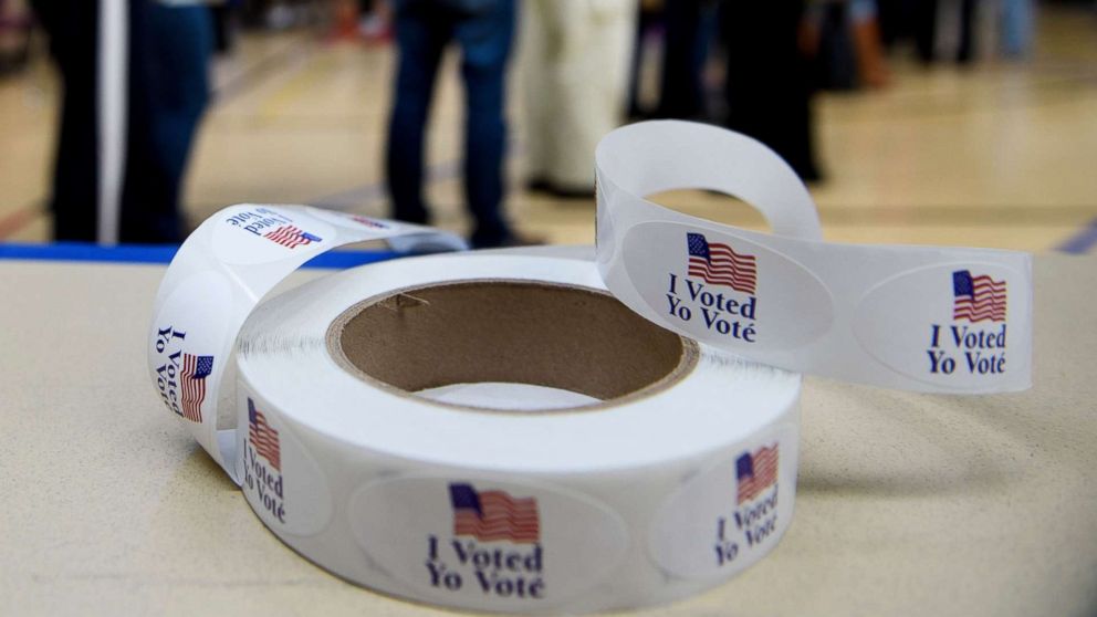 PHOTO: People wait in line during early voting at a community center, Oct. 25, 2018, in Potomac, Md., two weeks ahead of the key US midterm polls. 