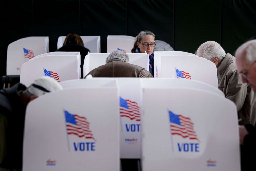 PHOTO: Voters voted in a community center during an advance poll Oct. 25, 2018 in Potomac, Maryland.