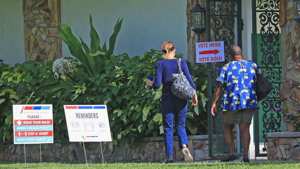 PHOTO: Voters head into the polling location at the First Baptist Church on Nov. 3, 2020 in Wellington, Fla.