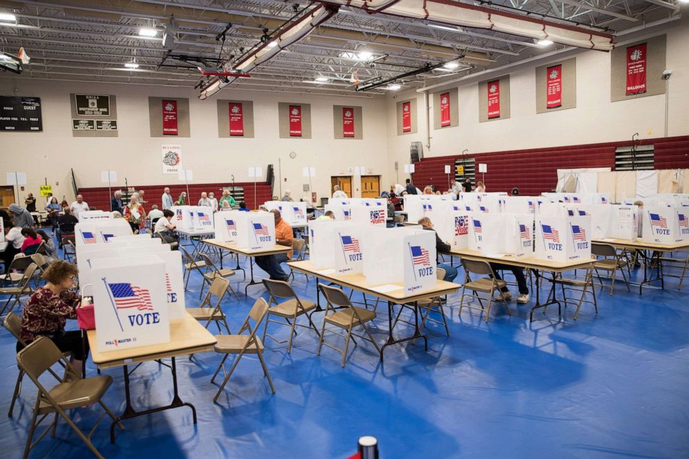 PHOTO: Voters fill out their ballots at Bedford High School during the New Hampshire Primary on Sept. 13, 2022, in Bedford, N.H.