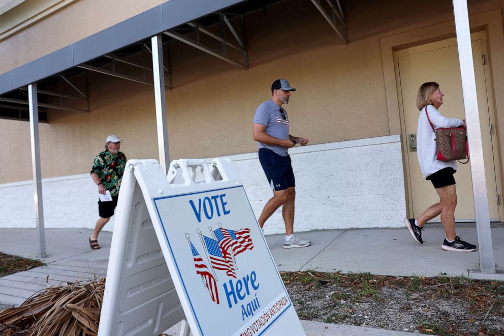 PHOTO: Voters arrive to cast their ballots at a polling station setup in the Lee County Election Headquarters building on Oct. 24, 2022, in Fort Myers, Fla.