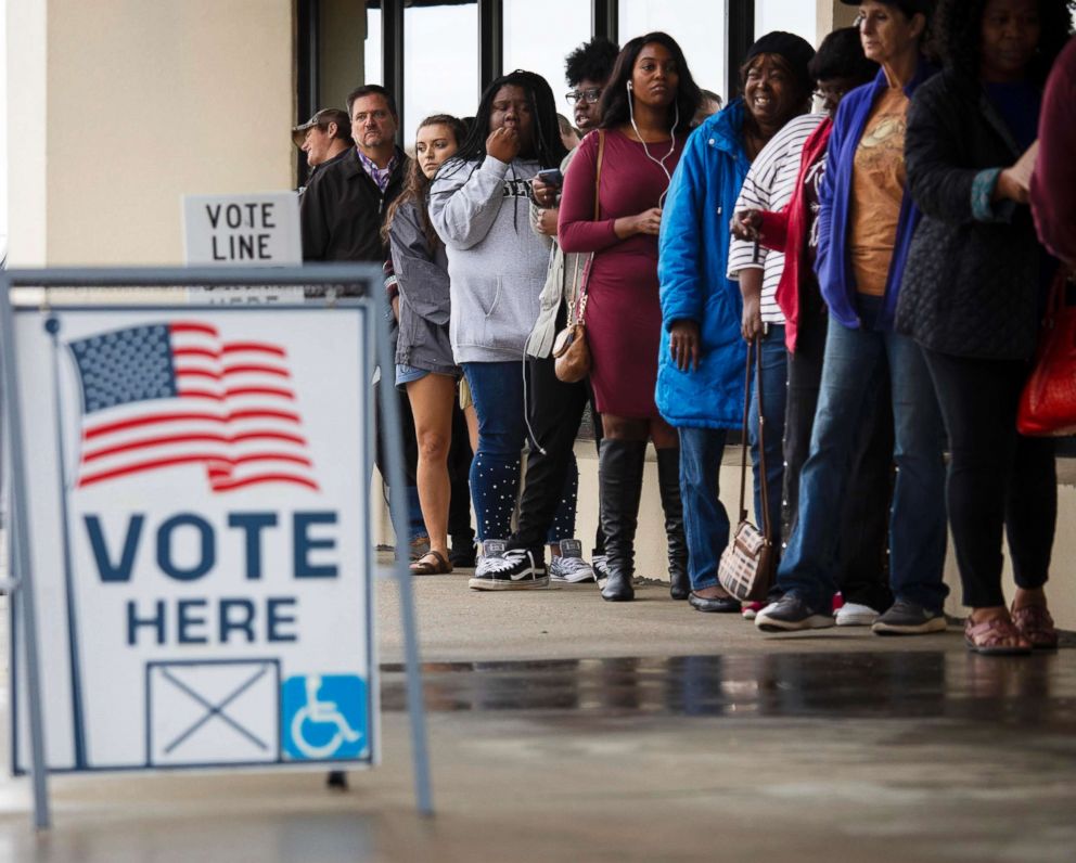 Voters line up to cast their ballots early in Macon, Ga., Nov. 2, 2018.
