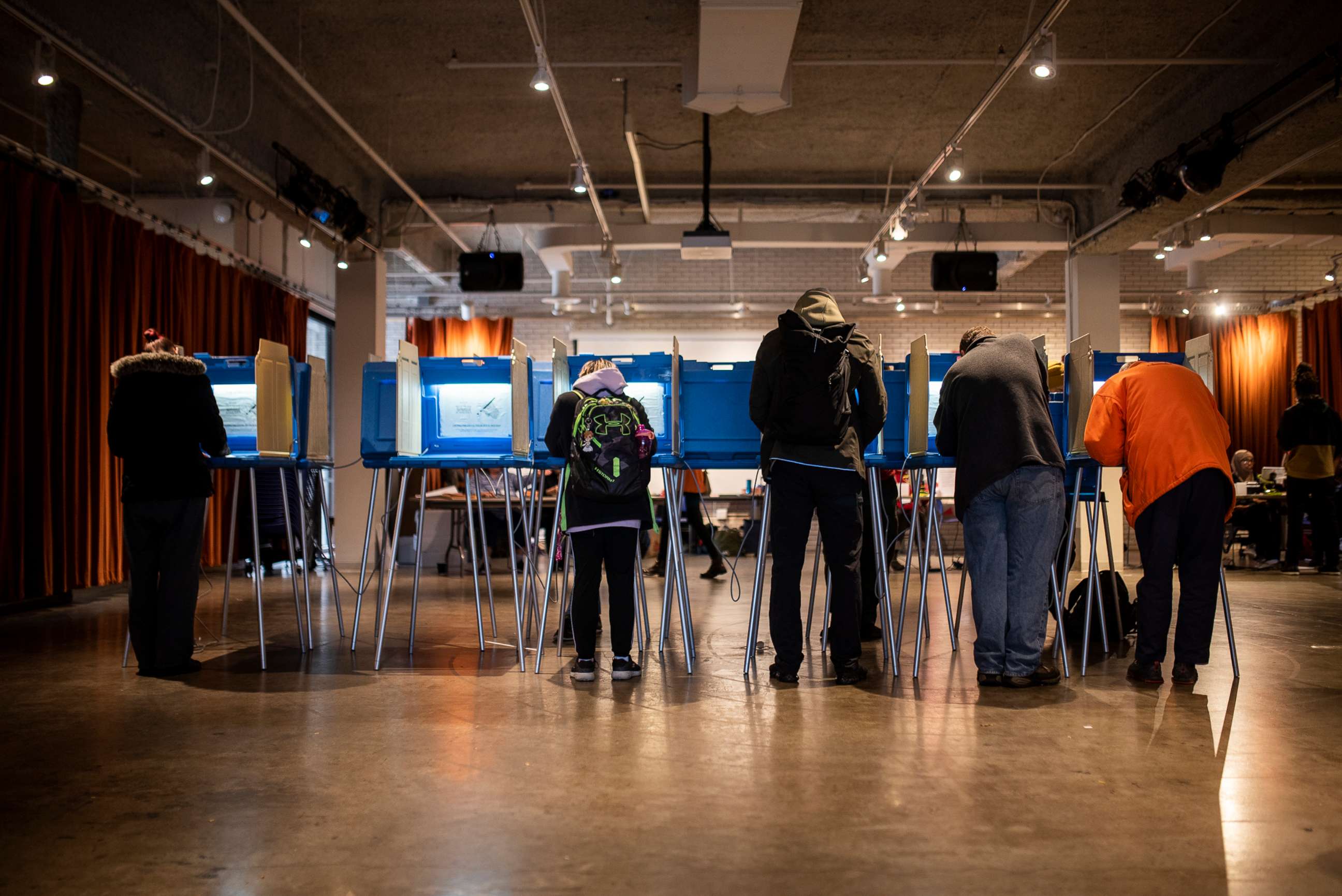 PHOTO: Voters fill out their ballots at the Minneapolis College of Art and Design, Nov. 6, 2018, in Minneapolis. 
