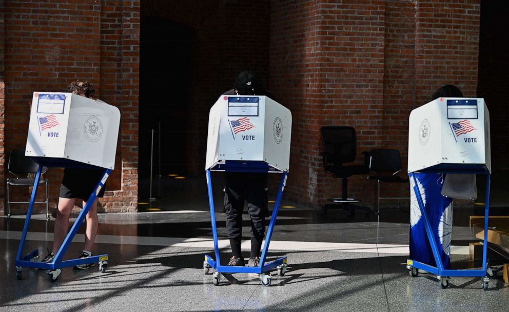 PHOTO: People vote at the Brooklyn Museum polling site during the New York Democratic presidential primary elections in New York, June 23, 2020.