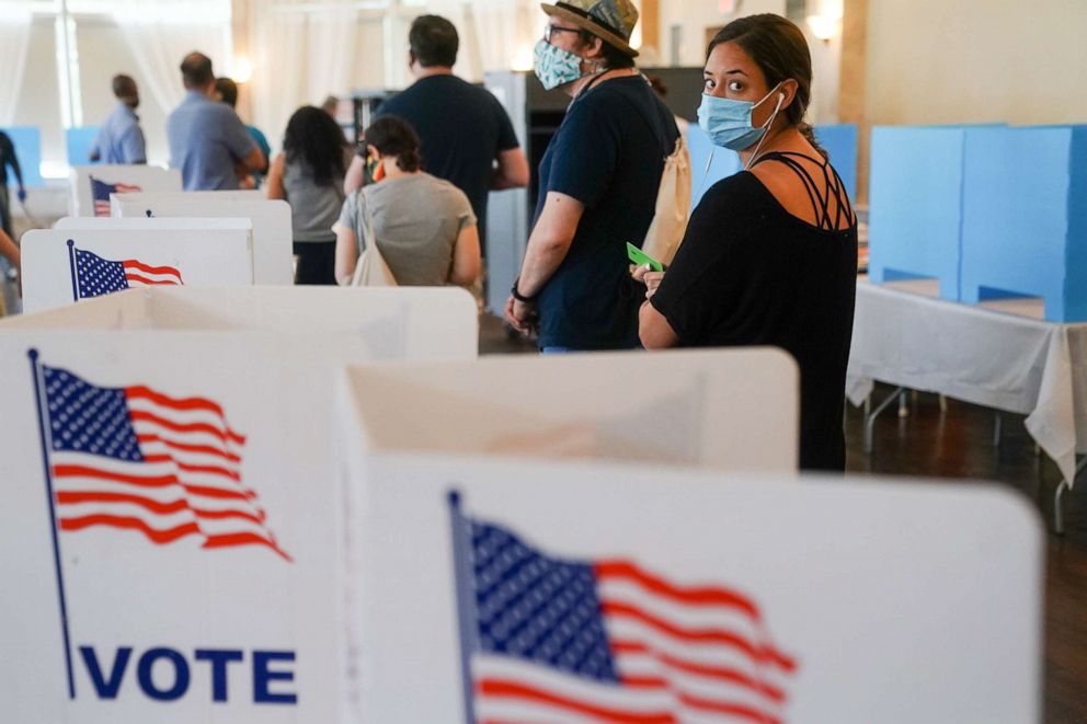 PHOTO: People wait in line to vote in Georgia's primary election, June 9, 2020 in Atlanta. Voters in Georgia, West Virginia, South Carolina, North Dakota, and Nevada are holding primaries amid the coronavirus pandemic.