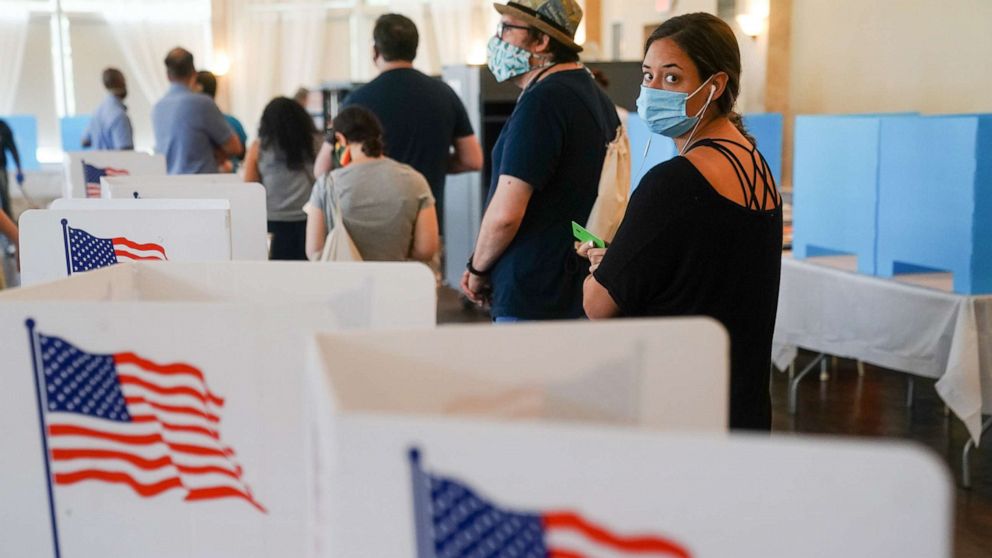 PHOTO: People wait in line to vote in Georgia's primary election, June 9, 2020 in Atlanta. Voters in Georgia, West Virginia, South Carolina, North Dakota, and Nevada are holding primaries amid the coronavirus pandemic.