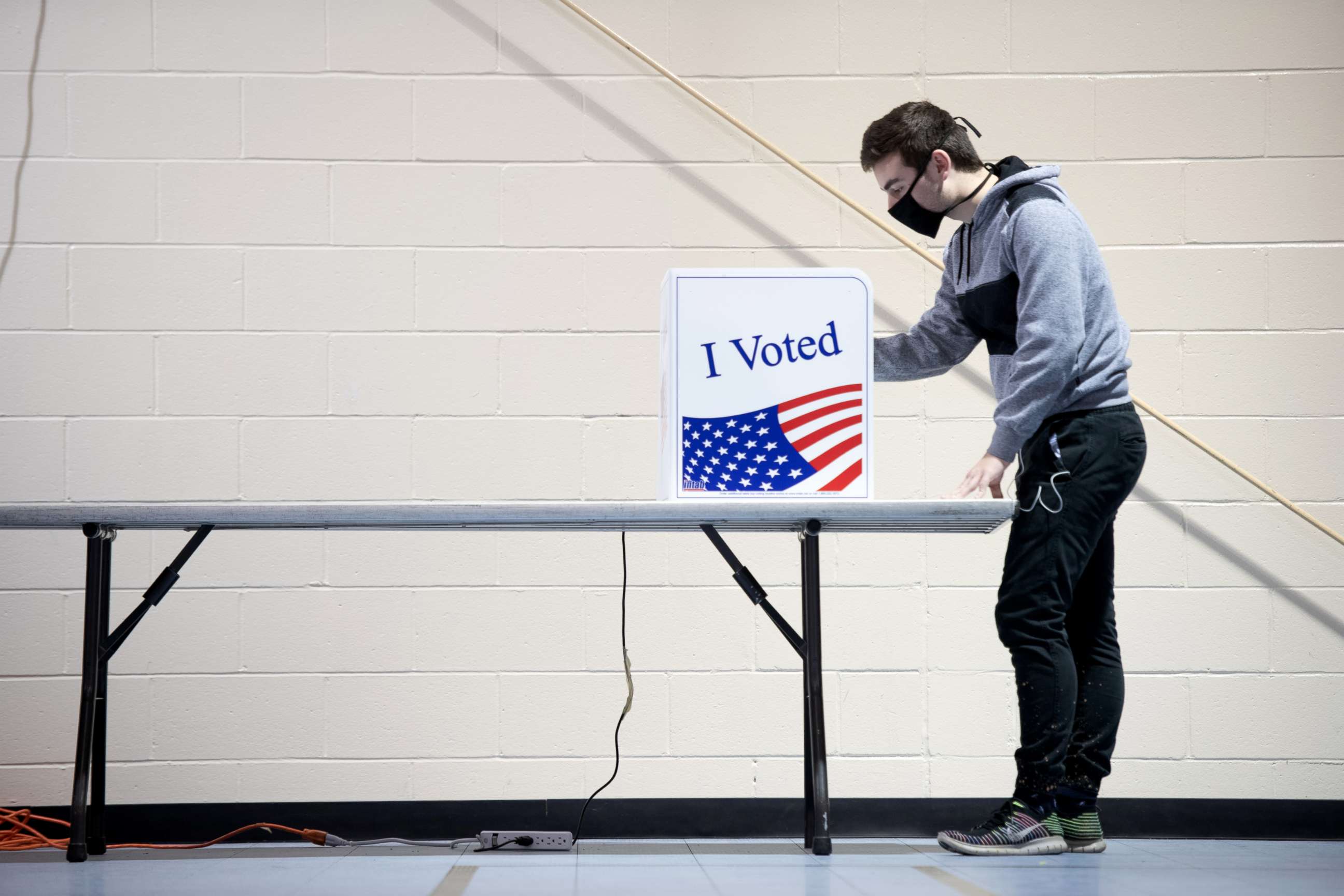 PHOTO: First-time voter Alex Jimenez uses a voting machine on November 3, 2020 in Columbia, South Carolina.