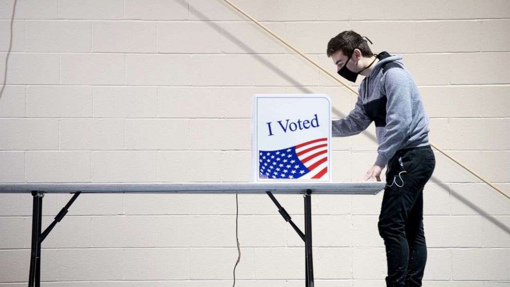PHOTO: First-time voter Alex Jimenez uses a voting machine on November 3, 2020 in Columbia, South Carolina.