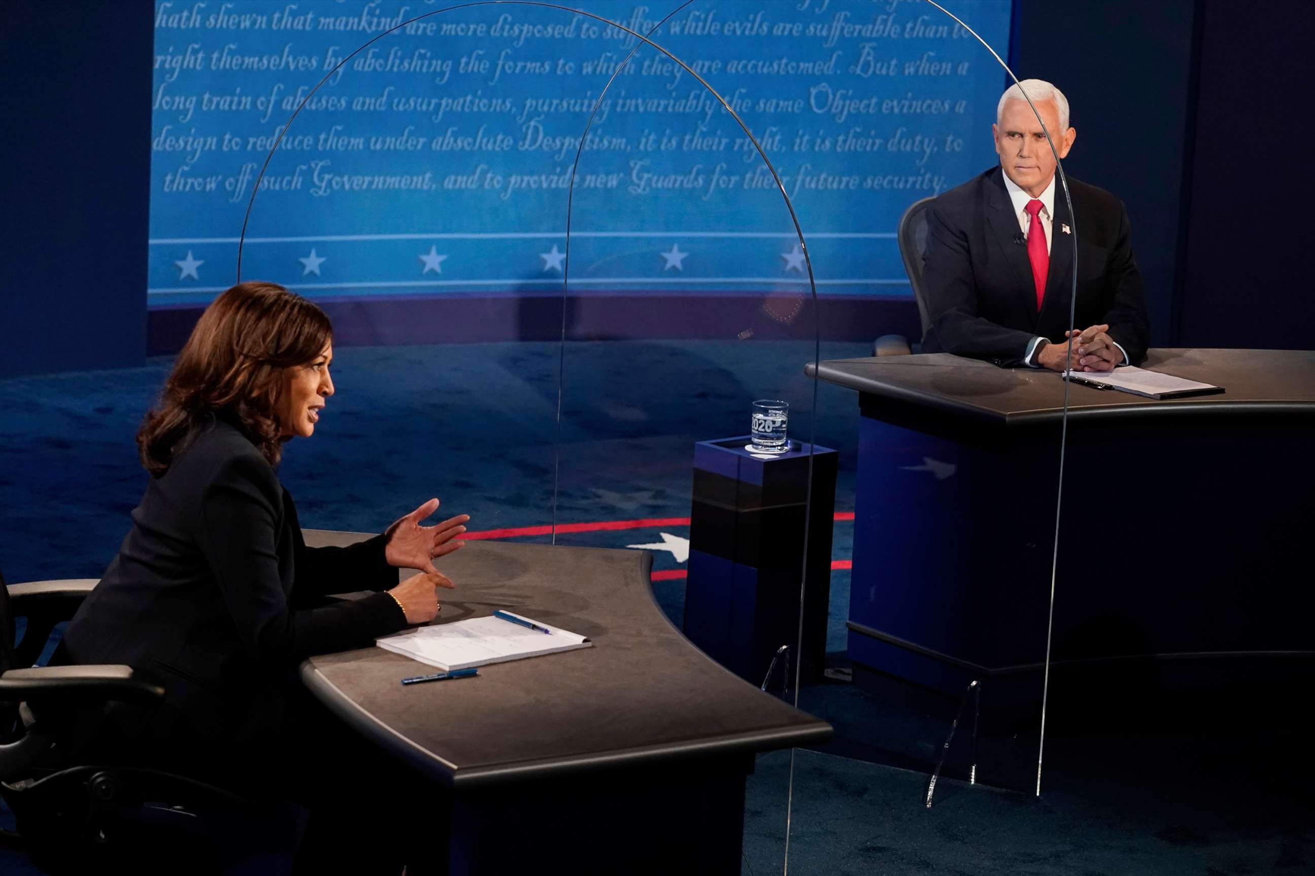 PHOTO: Vice President Mike Pence looks at Democratic vice presidential candidate Sen. Kamala Harris, as she answers a question during the vice presidential debate, Oct. 7, 2020, at the University of Utah in Salt Lake City.