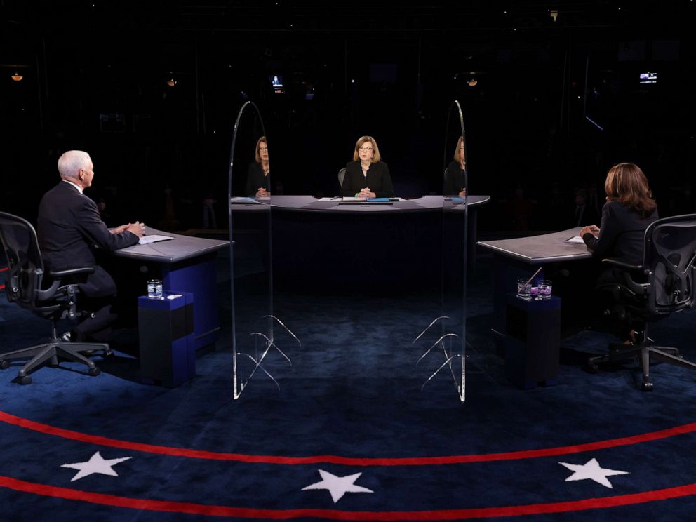 PHOTO: Democratic vice presidential nominee Sen. Kamala Harris and  Vice President Mike Pence participate in the vice presidential debate moderated by Washington Bureau Chief for USA Today Susan Page, center, Oct. 7, 2020 in Salt Lake City.