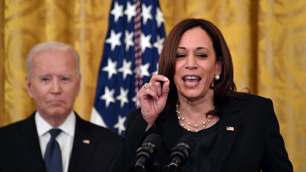PHOTO: Vice President Kamala Harris delivers remarks as President Joe Biden listens before signing the Covid-19 Hate Crimes Act, in the East Room of the White House, May 20, 2021.