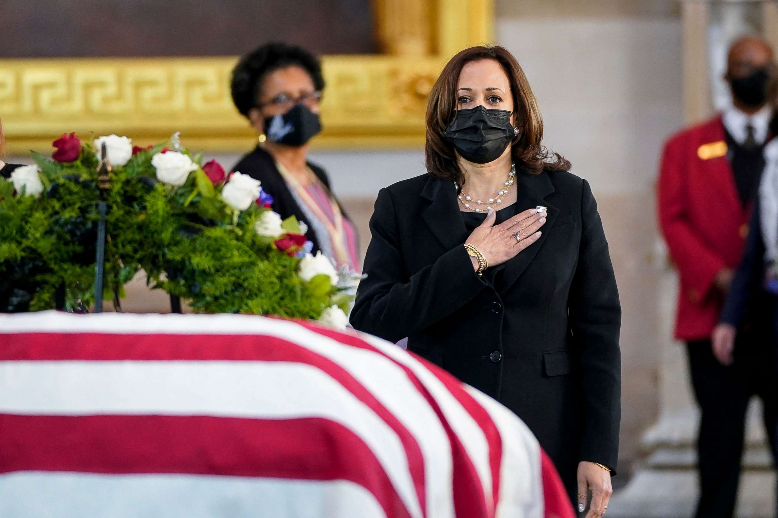 PHOTO: Vice President Kamala Harris pays her respects to slain US Capitol Police officer William "Billy" Evans as he lies in honor at the Capitol in Washington, DC, April 13, 2021.