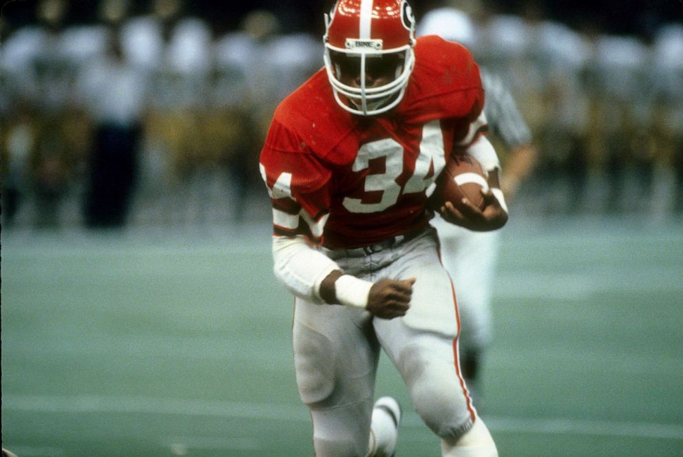 PHOTO: Running back Herschel Walker #34 of the University of Georgia Bull Dogs carries the ball against the Notre Dame Fighting Irish during the Sugar Bowl game January 1, 1981 at the Louisiana Superbowl in New Orleans.