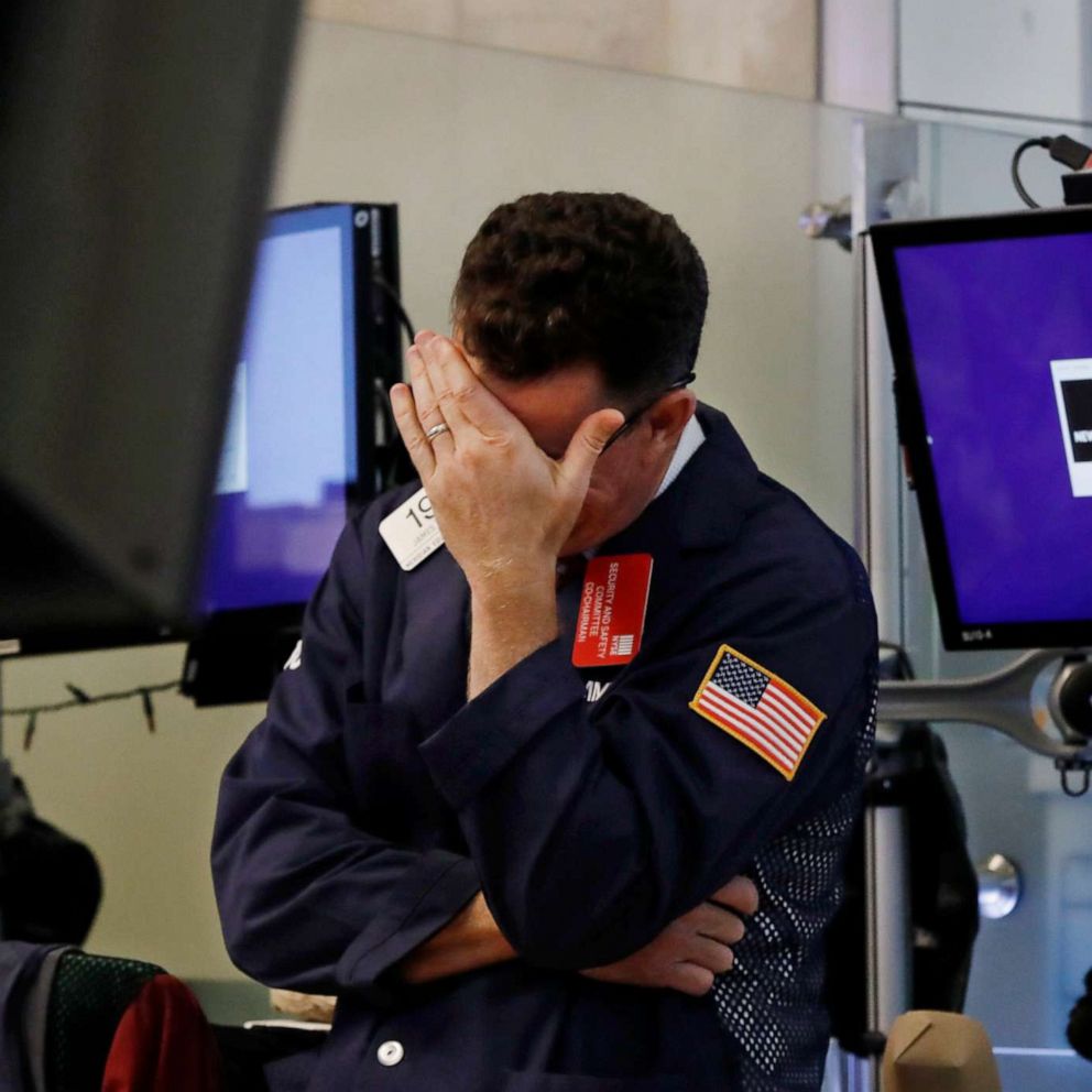 PHOTO: Trader James Coffey works on the floor of the New York Stock Exchange, Monday, Aug. 5, 2019.
