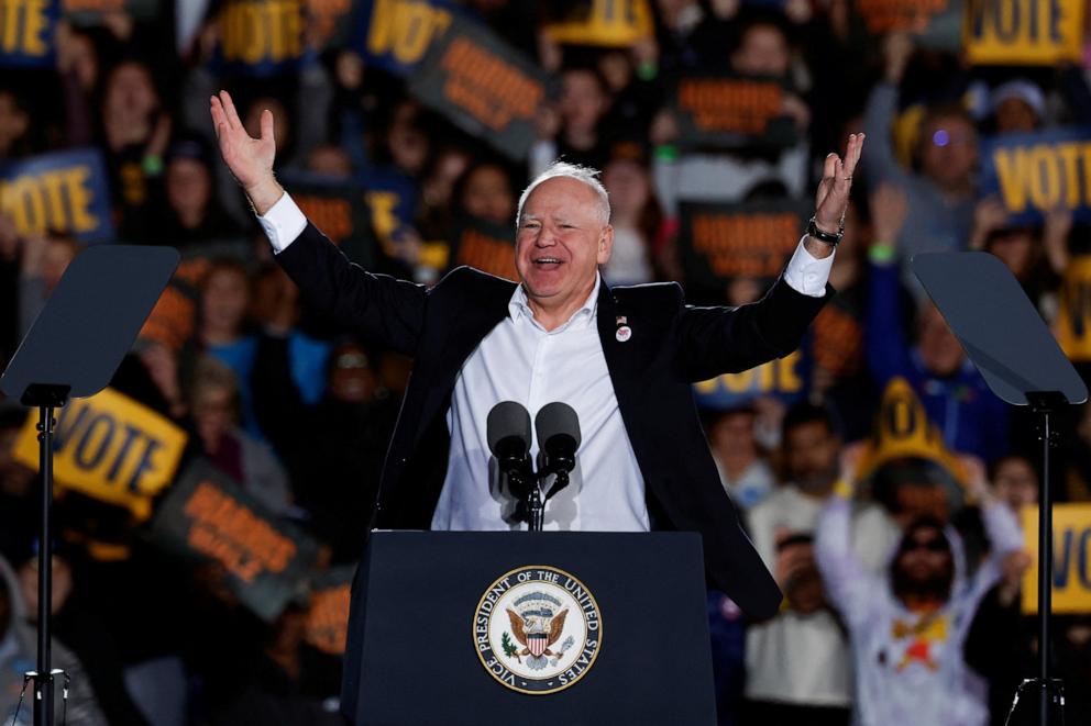 PHOTO: Democractic Vice-Presidential candidate Tim Walz gestures during a campaign rally and concert for Democratic presidential nominee Vice President Kamala Harris in Ann Arbor, Mich. Oct. 28, 2024.