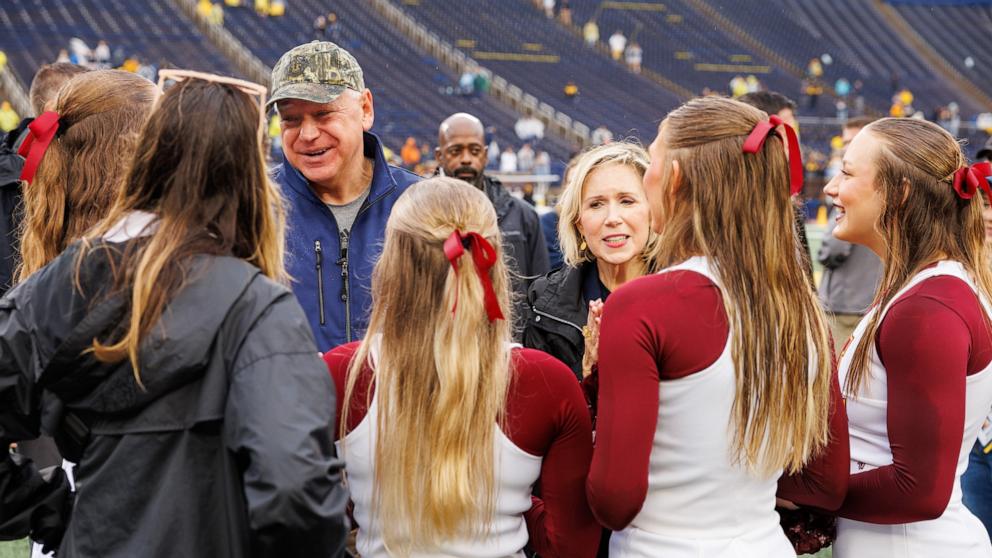 PHOTO: Minnesota Gov. Tim Walz visits the field of Michigan Stadium in Ann Arbor, Mich., on Sept. 28, 2024.