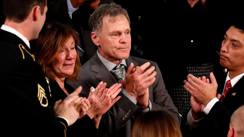 PHOTO: Otto Warmbier's parents Fred and Cindy Warmbier applaud as President Donald Trump talks about the death of their son Otto after his arrest in North Korea during the State of the Union address in Washington, D.C., Jan. 30, 2018.