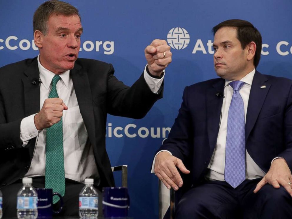PHOTO: Sen. Mark Warner (D-VA) and Sen. Marco Rubio (R-FL), both members of the Senate Intelligence Committee, participate in a discussion at the Atlantic Council July 16, 2018 in Washington.