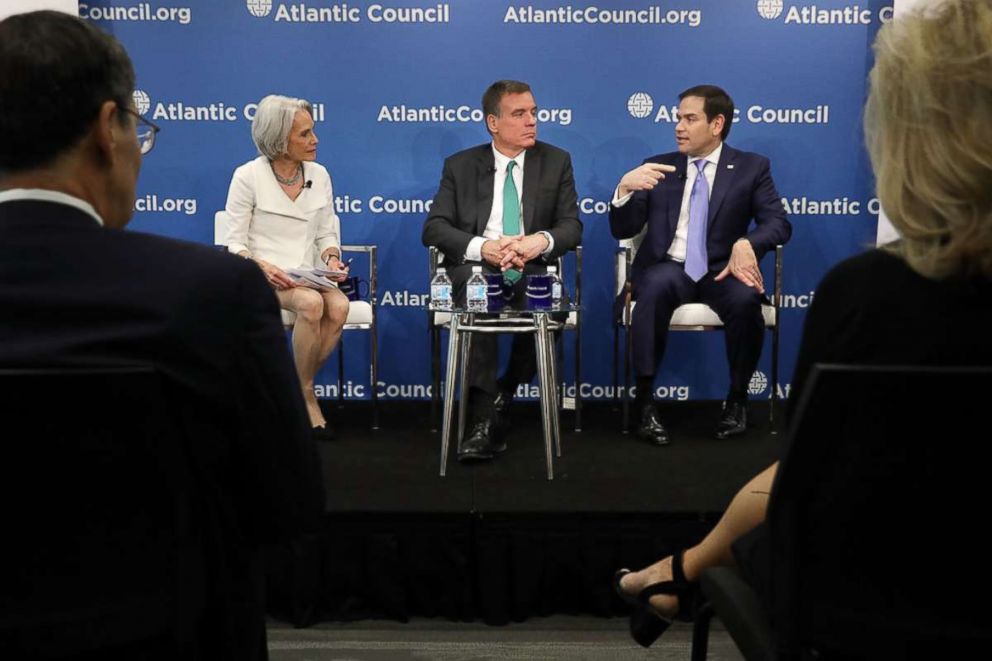 PHOTO: Sen. Mark Warner (D-VA) and Sen. Marco Rubio (R-FL), both members of the Senate Intelligence Committee, participate in a discussion at the Atlantic Council July 16, 2018 in Washington.