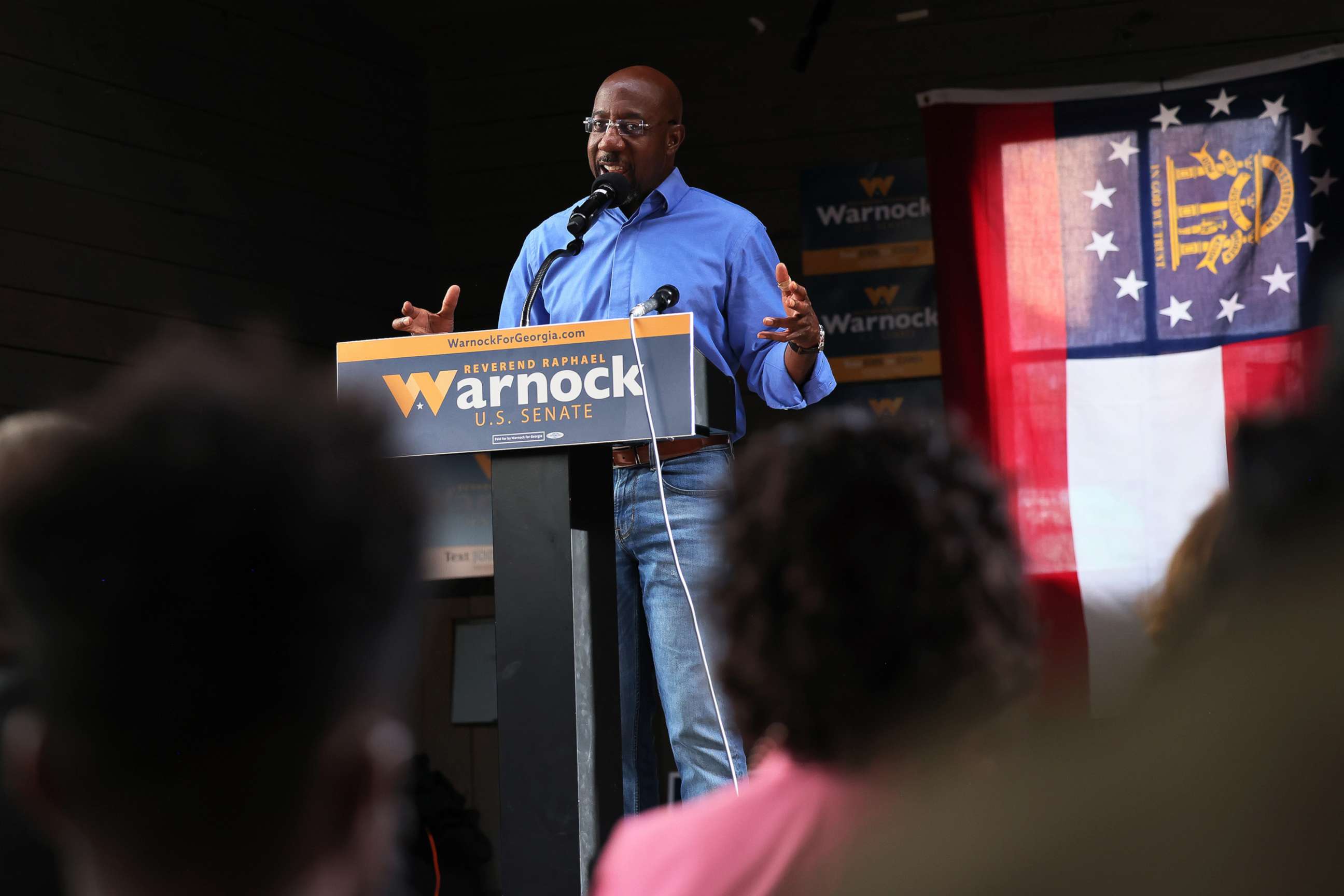PHOTO: Democratic Senate Candidate Sen. Raphael Warnock gives a speech to supporters during a Get Out the Vote rally at Bearfoot Tavern, Nov. 07, 2022, in Macon, Ga. 