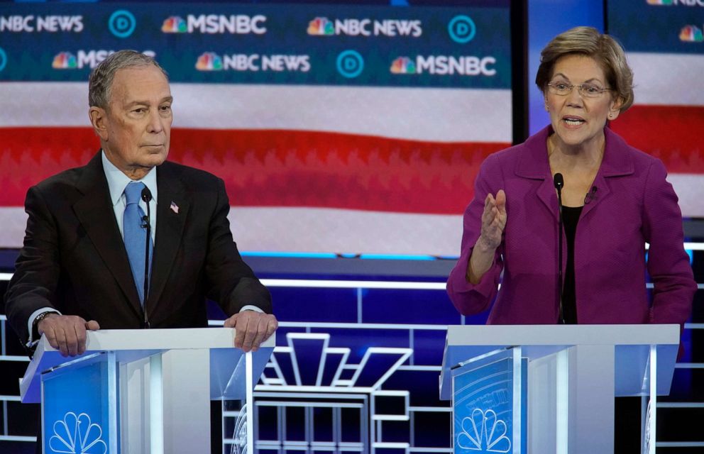 PHOTO: Senator Elizabeth Warren speaks as former New York City Mayor Mike Bloomberg listens at the ninth Democratic 2020 U.S. Presidential candidates debate at the Paris Theater in Las Vegas, Nev., Feb. 19, 2020.