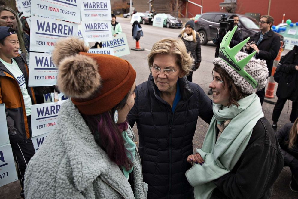 PHOTO: Senator Elizabeth Warren, a Democrat from Massachusetts and 2020 presidential candidate, center, greets supporters outside Wells Fargo Arena ahead of the Iowa Democratic Party Liberty & Justice Dinner in Des Moines, Iowa, U.S.