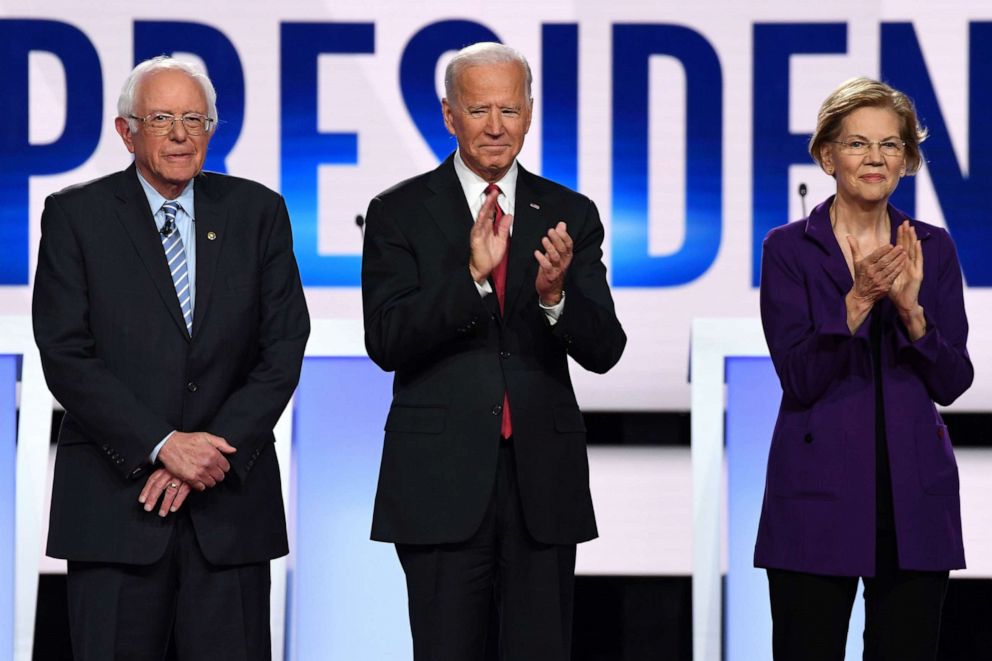 PHOTO: In this file photo taken on Oct. 15, 2019, Democratic presidential hopefuls Senator Bernie Sanders, former US Vice President Joe Biden and Senator Elizabeth Warren arrive onstage for the Democratic primary debate at in Westerville, Ohio.