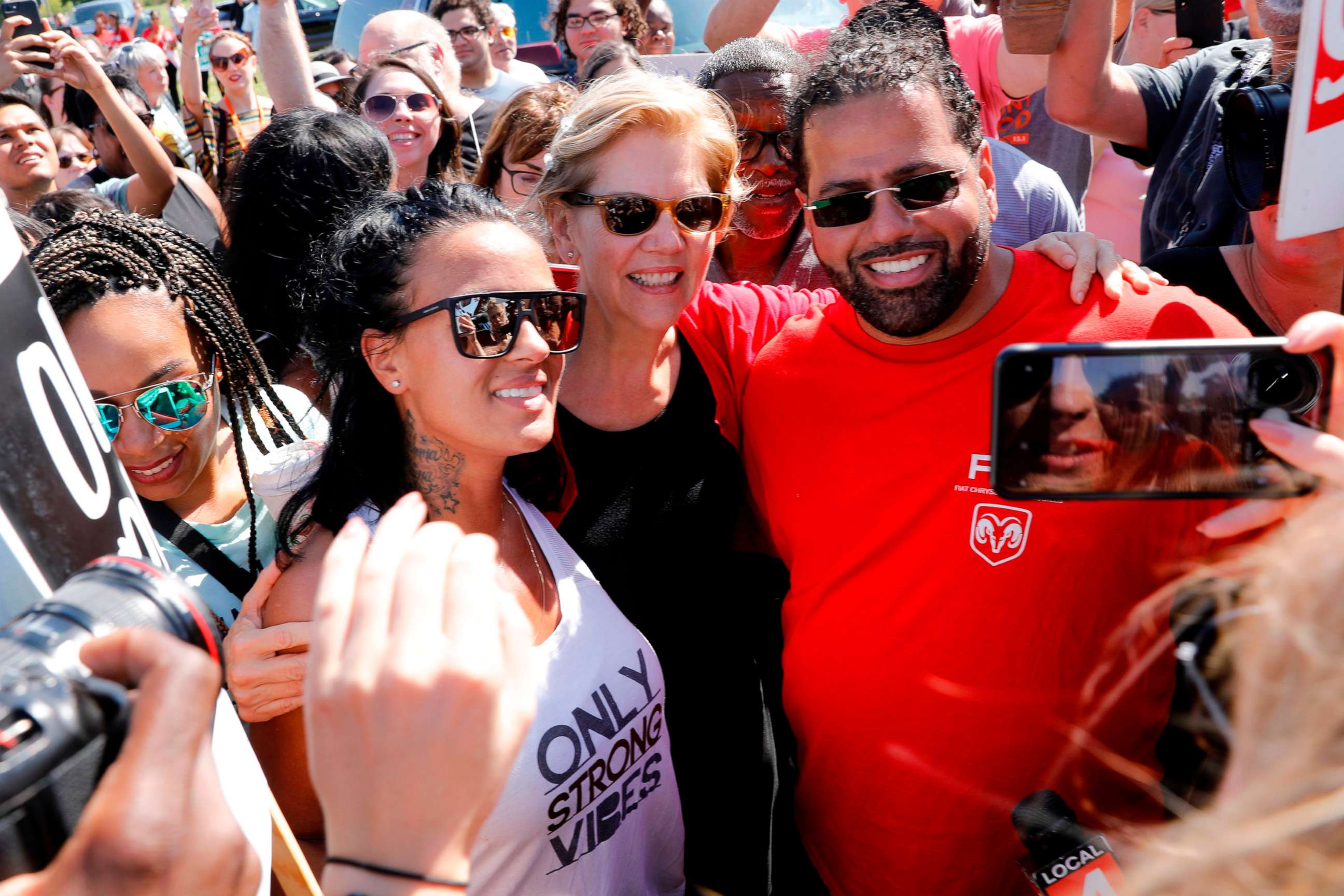 PHOTO: Senator Elizabeth Warren joins members of the United Auto Workers (UAW) and supporters as they picket outside of General Motors Detroit-Hamtramck Assembly in Detroit, Michigan, as they strike on September 22, 2019.