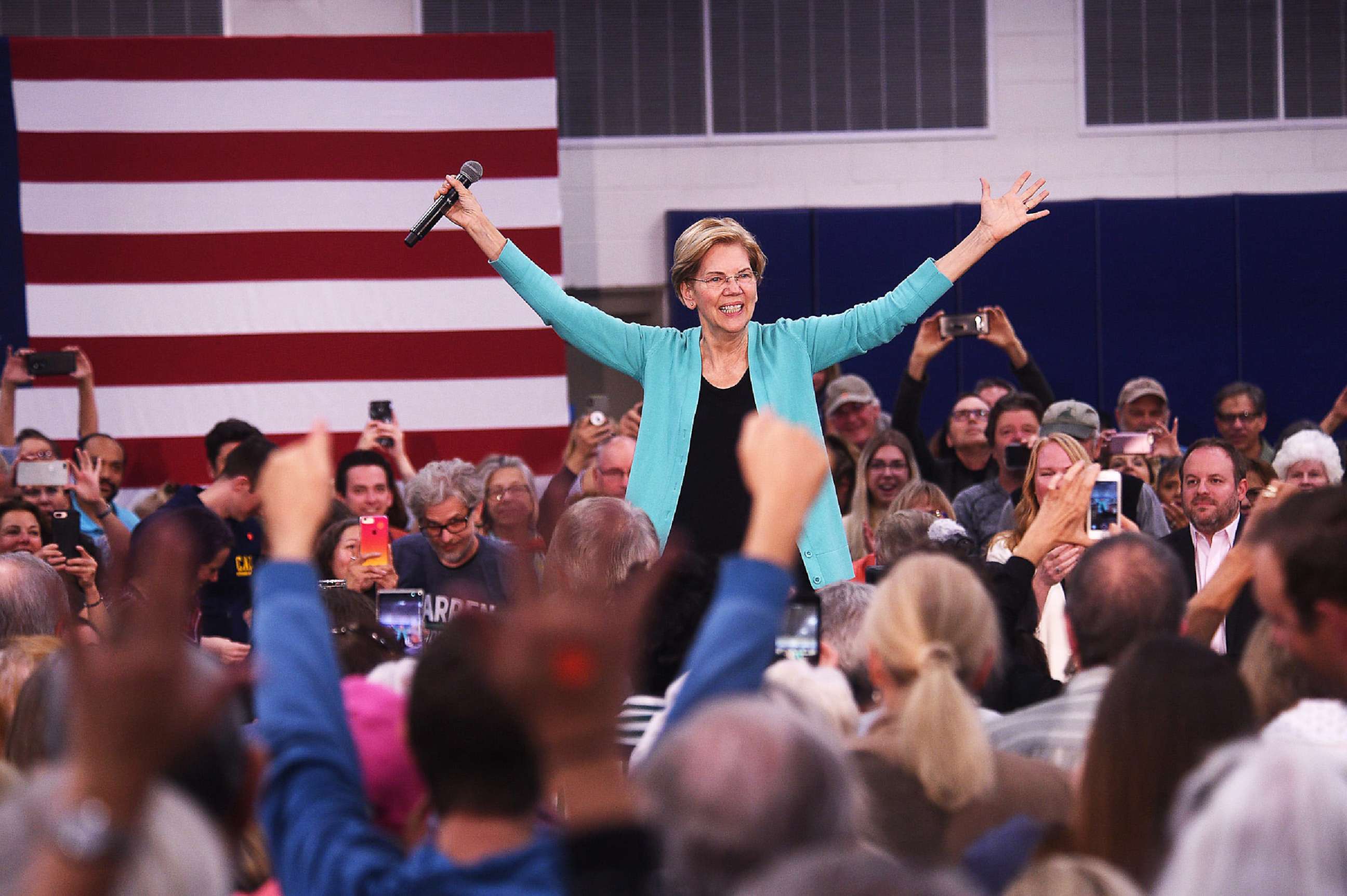 PHOTO: Senator Elizabeth Warren greets her supporters while holding a campaign rally at the MAC Multi-Purpose Athletic Center Facility in Carson City, Nev., Oct. 2, 2019.