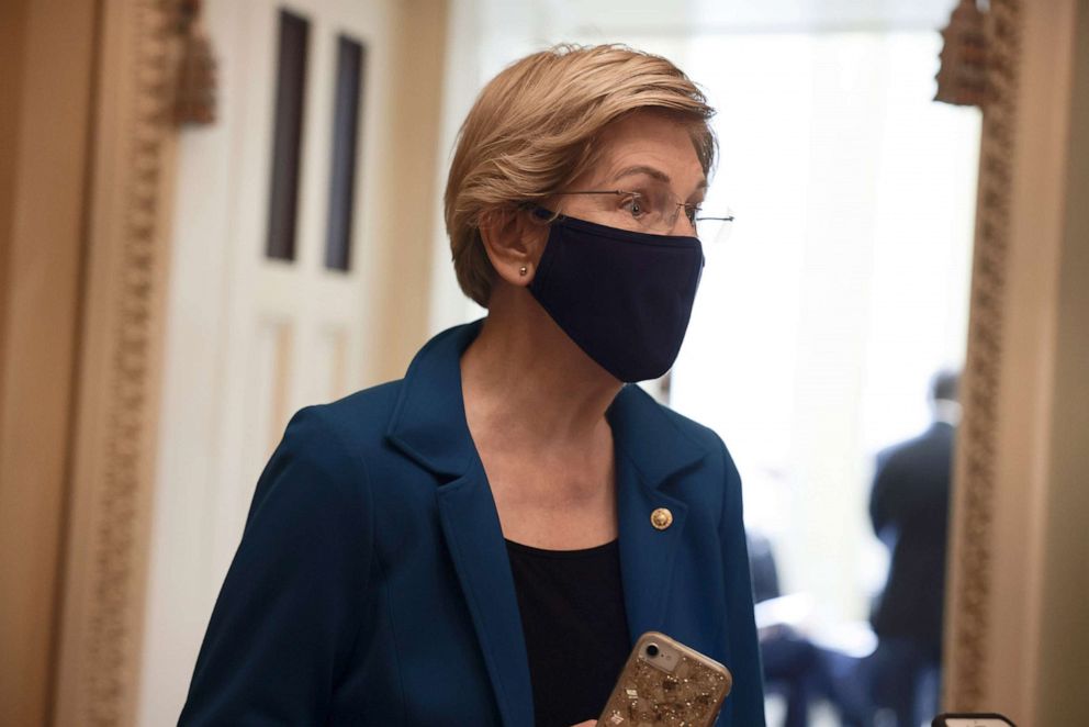 PHOTO: Sen. Elizabeth Warren speaks to reporters outside of the Democratic Policy luncheon at the Capitol, Oct. 5, 2021.