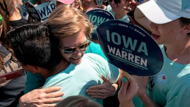 PHOTO: 2020 Democratic presidential hopeful Sen. Elizabeth Warren, D-Mass., greets supporters as she arrives at a rally outside the building where the Wing Ding Dinner will take place on Aug. 9, 2019 in Clear Lake, Iowa.