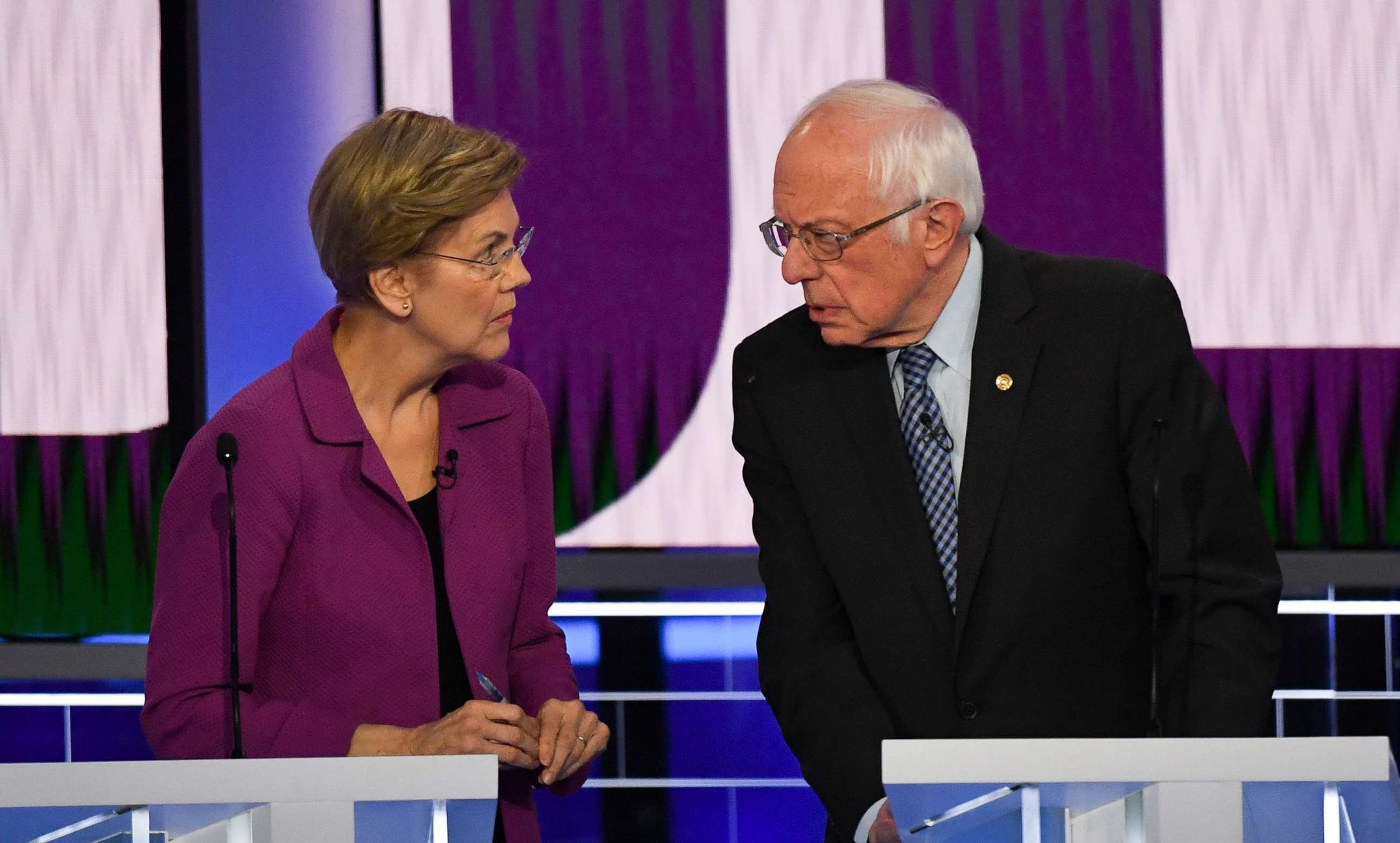 PHOTO: Democratic presidential hopefuls Sen. Elizabeth Warren and Sen. Bernie Sanders speak ahead of the ninth Democratic primary debate of the 2020 presidential campaign season at the Paris Theater in Las Vegas, Feb. 19, 2020.