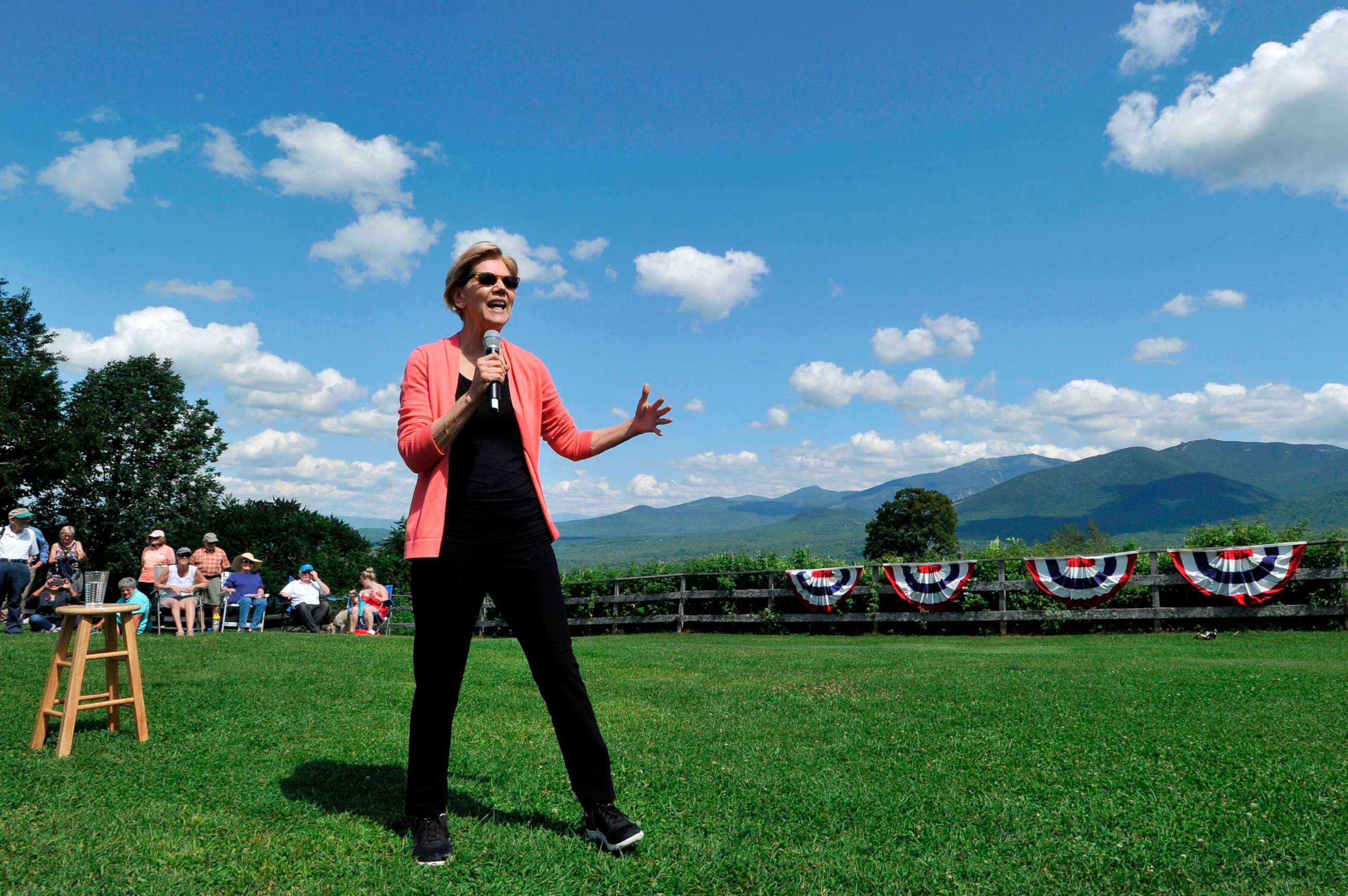 PHOTO: Democratic presidential candidate Elizabeth Warren speaks to supporters during a campaign stop and town hall at Toad Hill Farm in Franconia, New Hampshire, overlooking the White Mountains on Aug. 14, 2019.