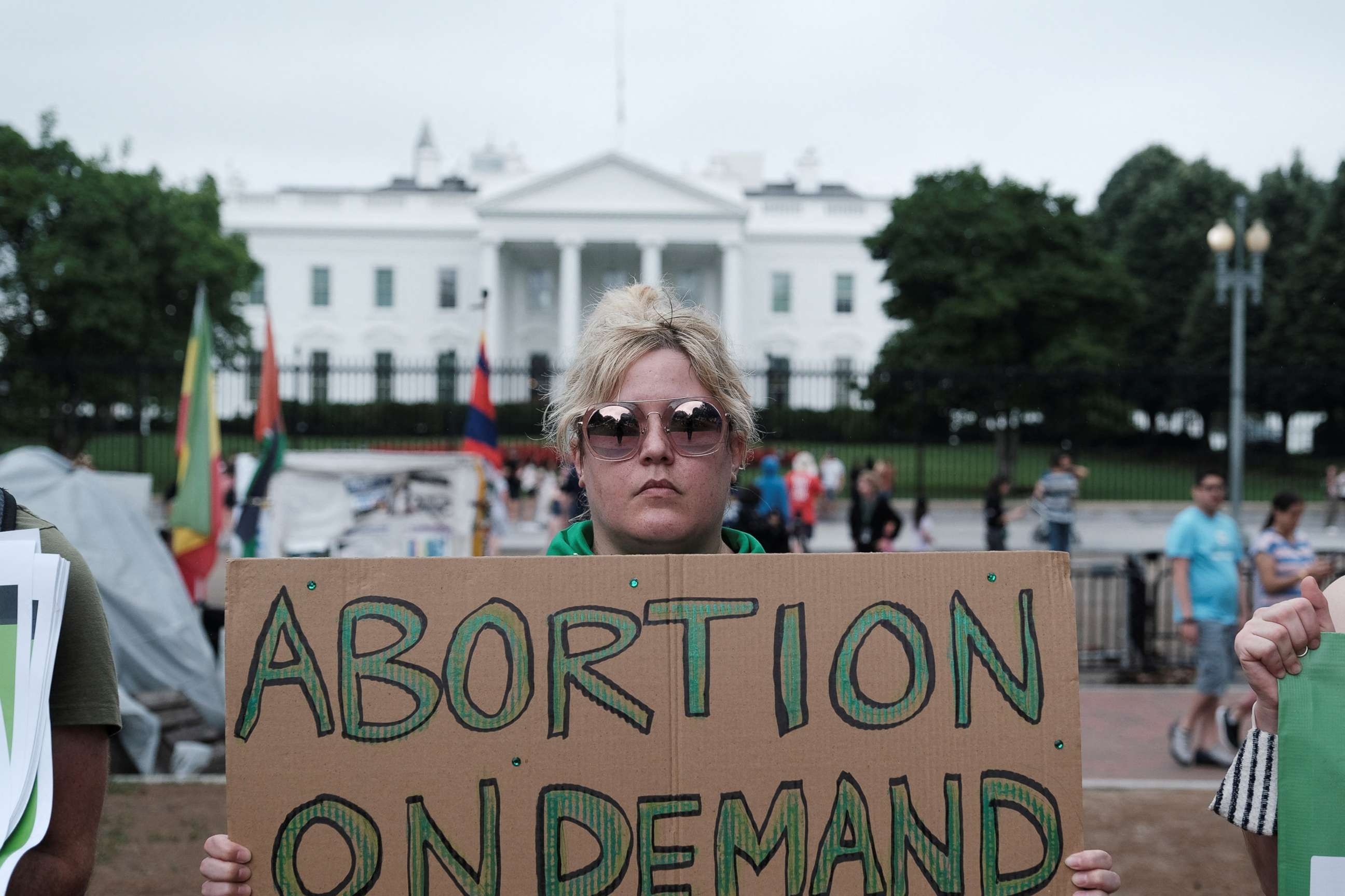 PHOTO: A Women's March activist attends a protest in the wake of the U.S. Supreme Court's decision to overturn the landmark Roe v. Wade abortion decision, in Washington, D.C., July 9, 2022. 