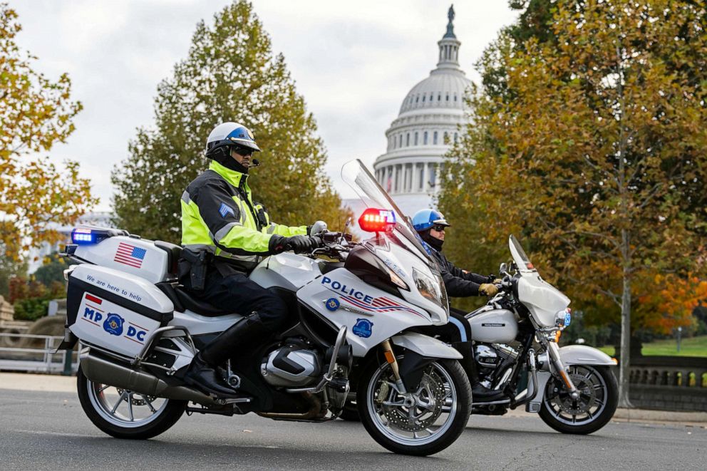 PHOTO: FILE - Members of the Metropolitan Police Department motorcycle unit patrol near the West Front of the U.S. Capitol during the 47th annual Marine Corps Marathon, Oct. 30, 2022.
