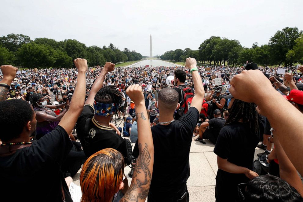 PHOTO: Demonstrators protest Saturday, June 6, 2020, at the Lincoln Memorial in Washington, over the death of George Floyd, a black man who was in police custody in Minneapolis.