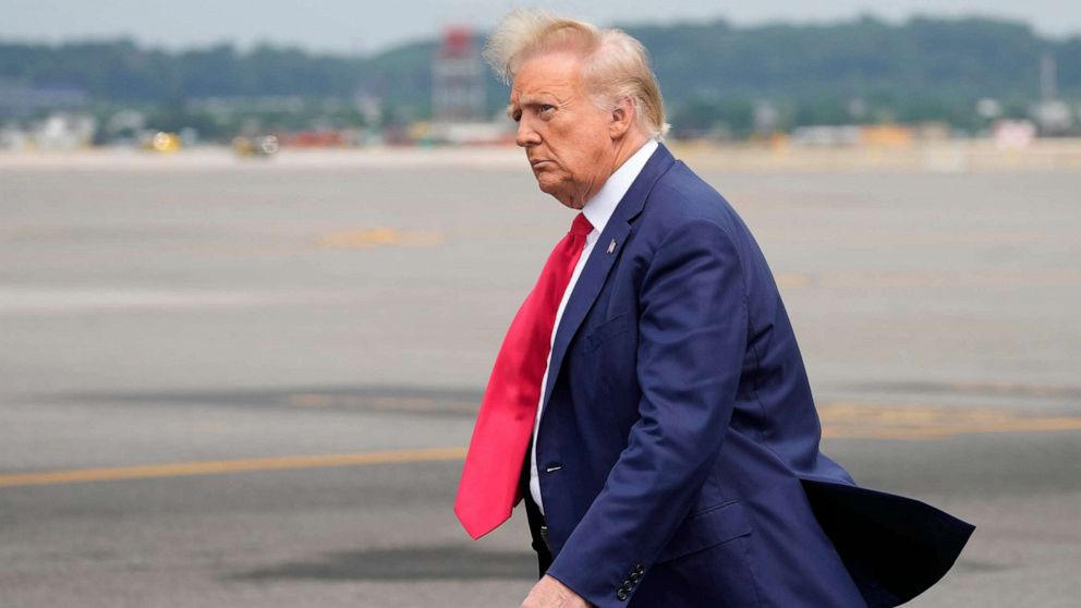 PHOTO: Former President Donald Trump arrives at Ronald Reagan Washington National Airport, Aug. 3, 2023, in Arlington, Va., as he heads to Washington to face a judge on federal conspiracy charges alleging Trump conspired to subvert the 2020 election.